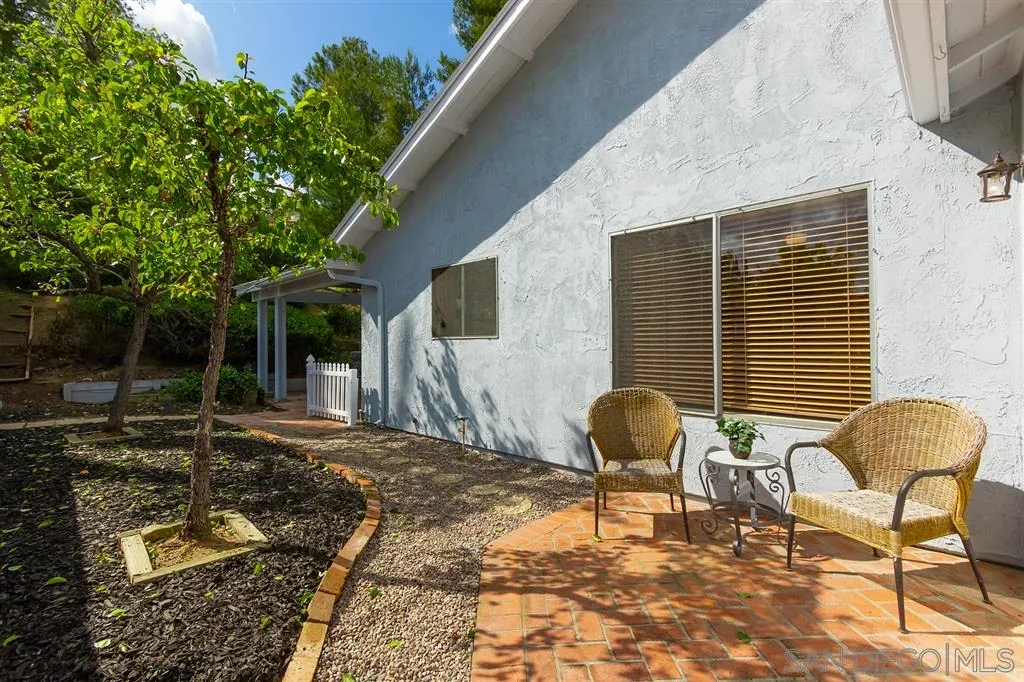 13856 Olive Grove Place Poway, CA 92064 - Photo 24 of 25 a view of a two chairs in the back yard
