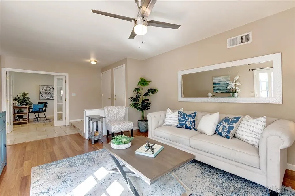 13856 Olive Grove Place Poway, CA 92064 - Photo 4 of 25 a living room with furniture and wooden floor