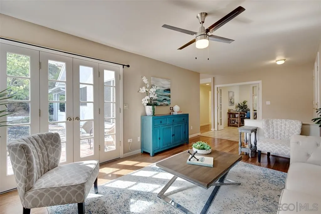 13856 Olive Grove Place Poway, CA 92064 - Photo 5 of 25 a living room with furniture and a large window