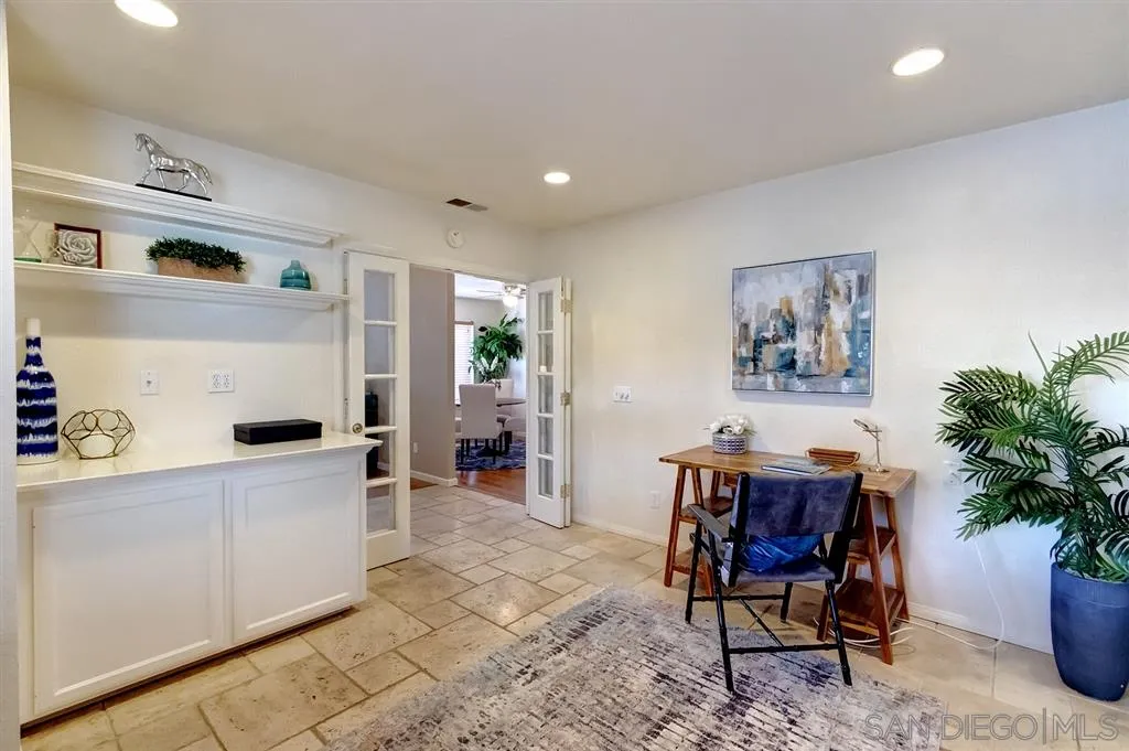 13856 Olive Grove Place Poway, CA 92064 - Photo 7 of 25 a living room with furniture and a potted plant