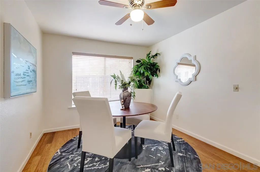 13856 Olive Grove Place Poway, CA 92064 - Photo 8 of 25 a view of a dining room with furniture and a window