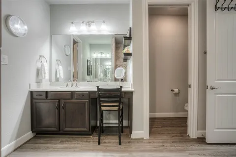 a view of a livingroom with furniture and wooden floor