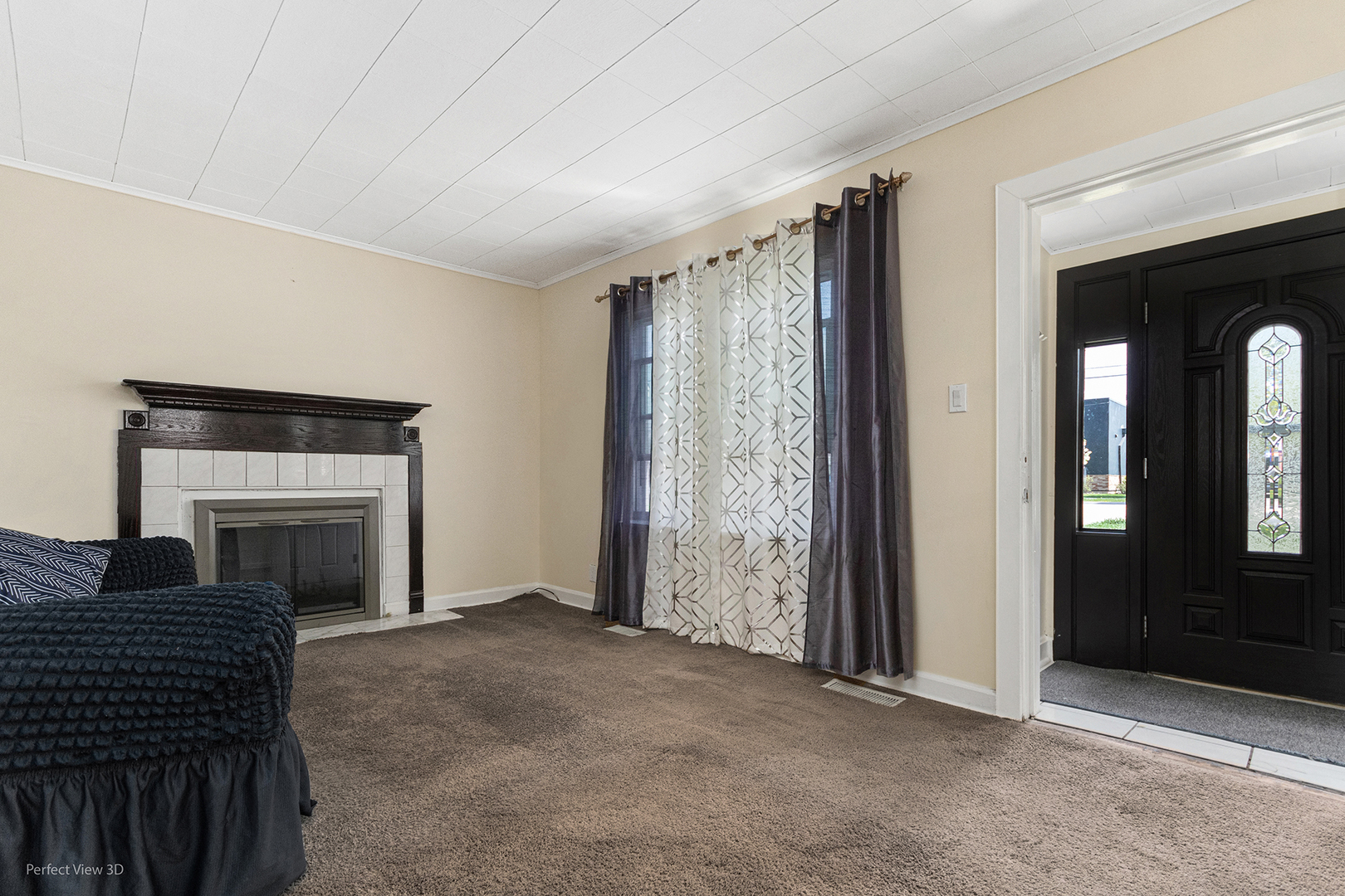 328 North Addison Road Wood Dale, IL 60191 - Photo 3 of 22 an empty room with windows and fireplace