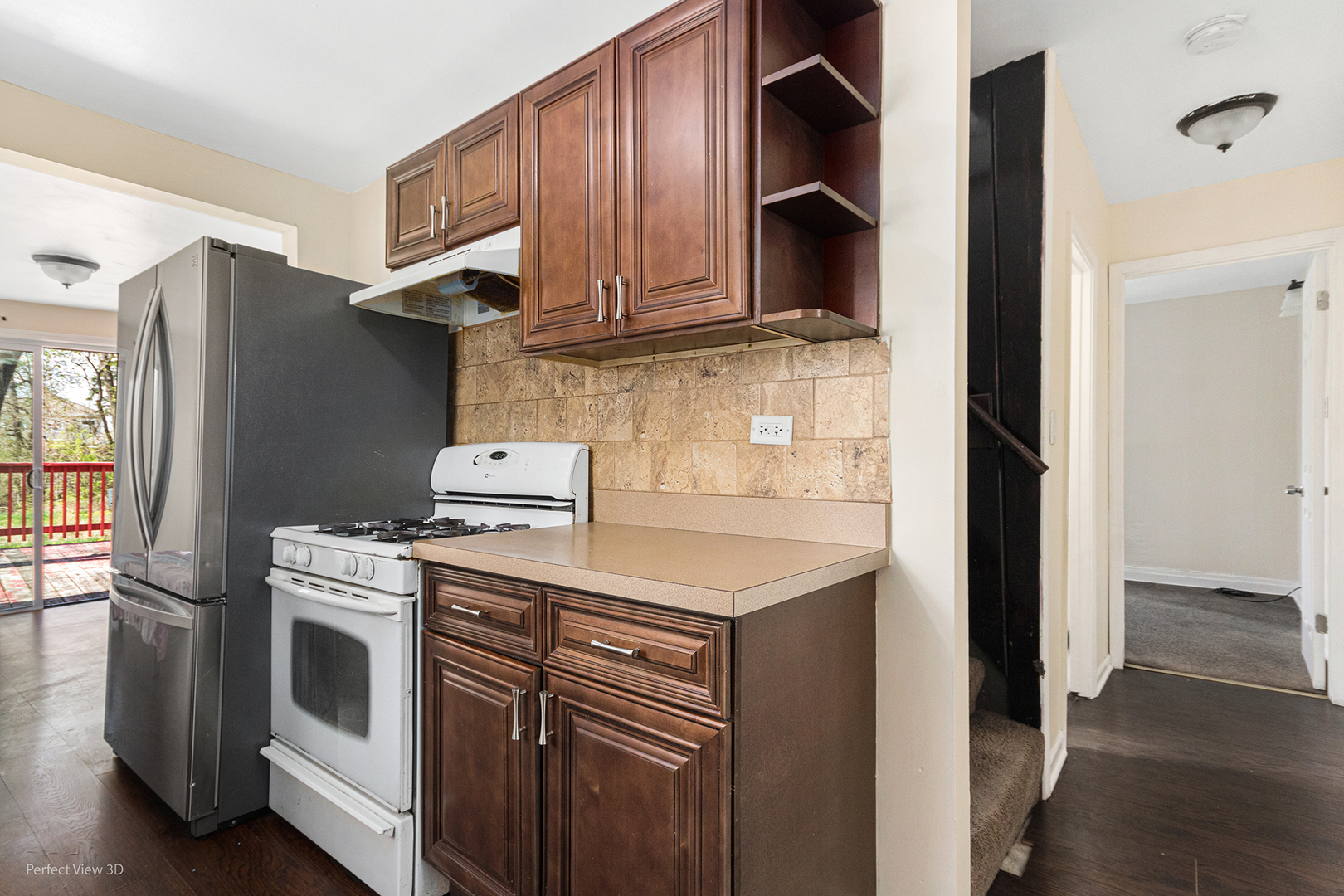 328 North Addison Road Wood Dale, IL 60191 - Photo 8 of 22 a kitchen with stainless steel appliances granite countertop a refrigerator and a stove
