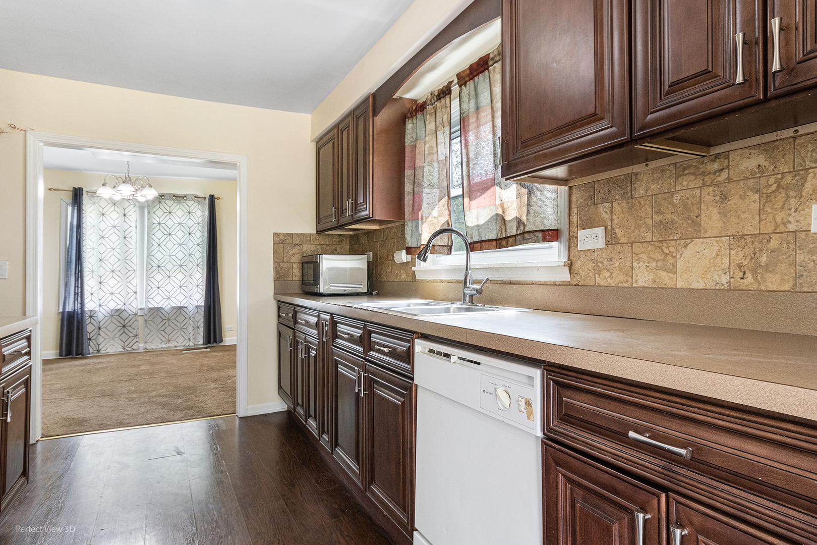 328 North Addison Road Wood Dale, IL 60191 - Photo 9 of 22 a kitchen with stainless steel appliances granite countertop a sink stove and cabinets