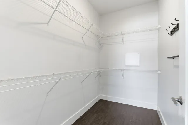 a view of a room with racks on the wall