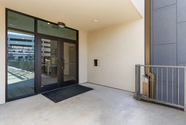 a tall building on the side of a street