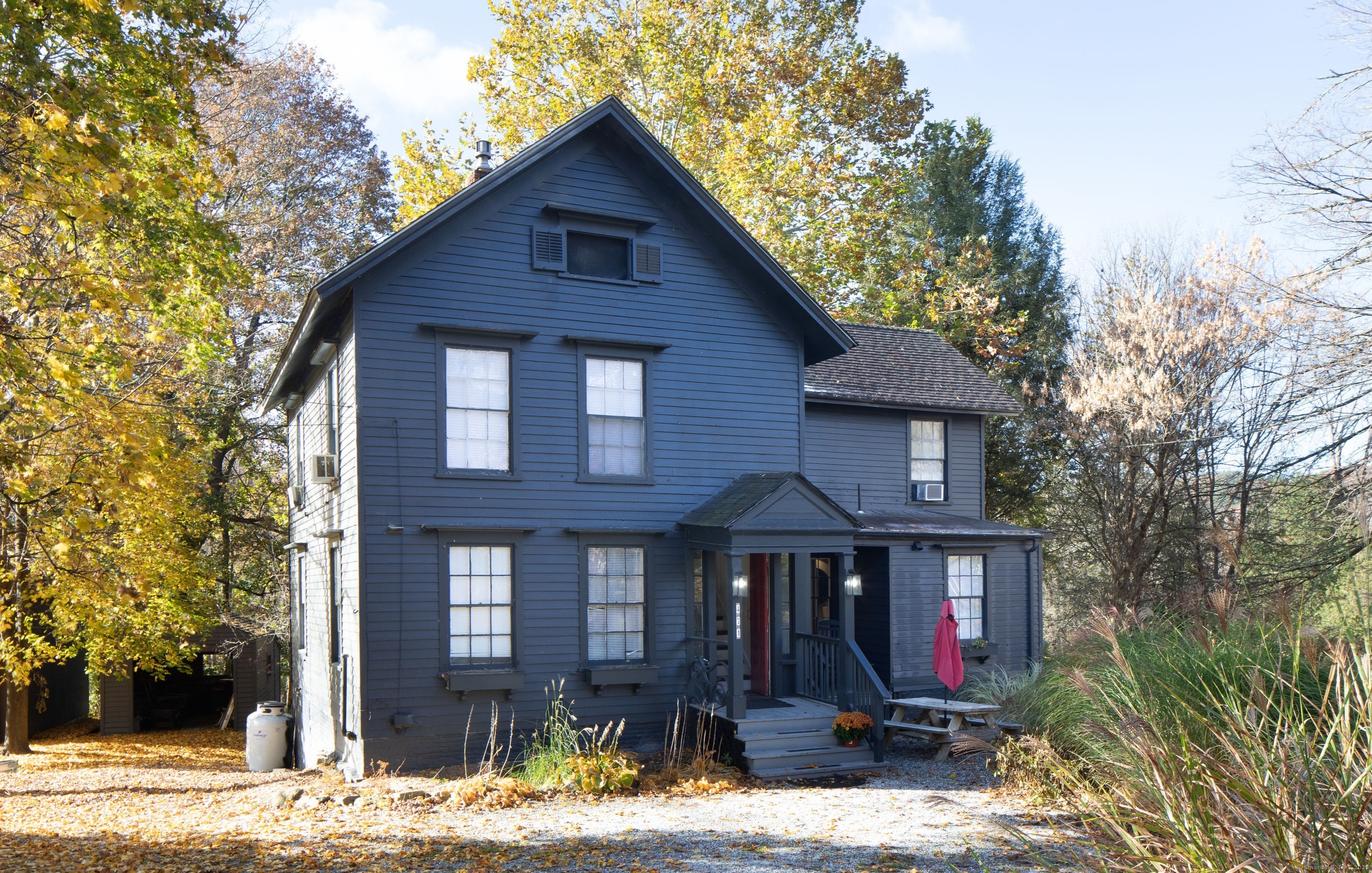 a front view of a house with yard