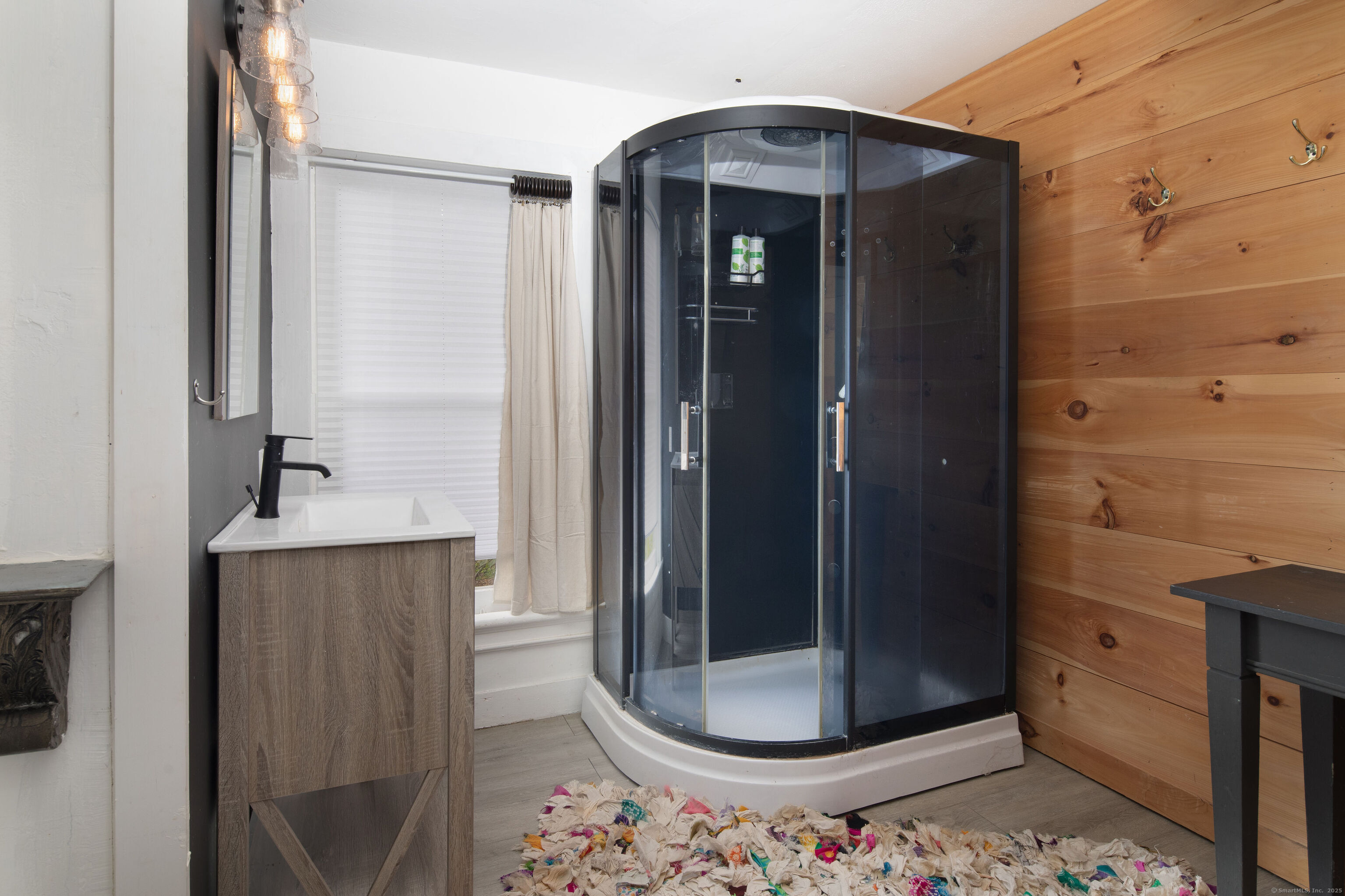 471 Lime Rock Road Salisbury, CT 06039 - Photo 19 of 24 a view of a bathroom with mirror