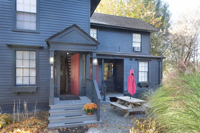 a front view of a house with patio