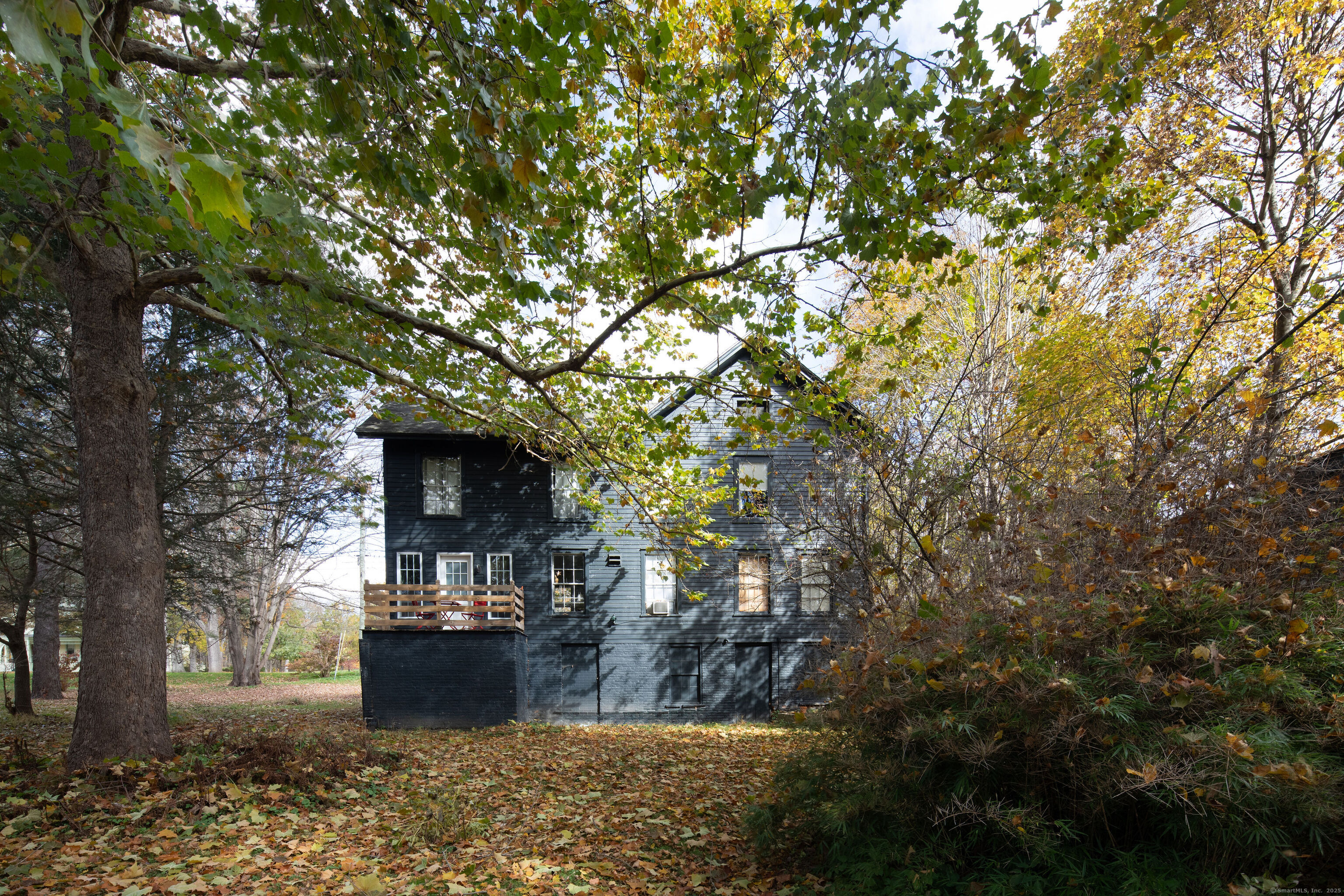 471 Lime Rock Road Salisbury, CT 06039 - Photo 24 of 24 a view of a house with a yard
