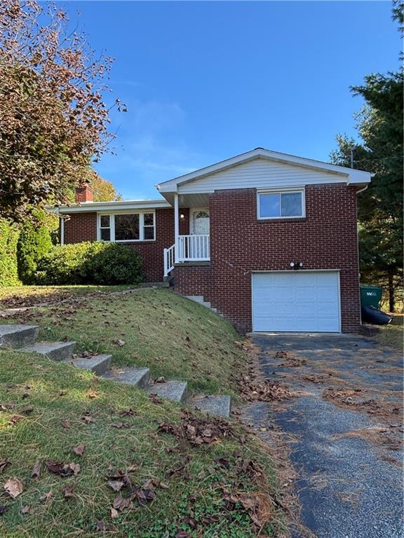 408 Highview Street Latrobe, PA 15650 - Photo 2 of 50 a front view of a house with garden