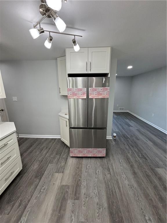 408 Highview Street Latrobe, PA 15650 - Photo 23 of 50 a room with wooden floor and staircase