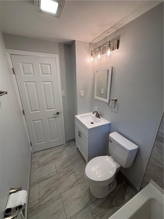 408 Highview Street Latrobe, PA 15650 - Photo 28 of 50 a bathroom with a toilet sink and mirror