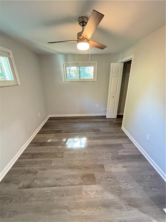 408 Highview Street Latrobe, PA 15650 - Photo 33 of 50 an empty room with wooden floor and windows