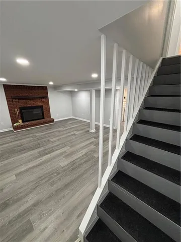a view of an empty room with stairs