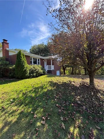 a house view with a garden space