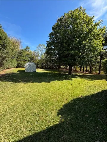 a view of a swimming pool with an outdoor space