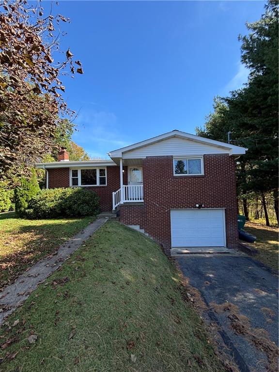 408 Highview Street Latrobe, PA 15650 - Photo 6 of 50 front view of a house with a yard