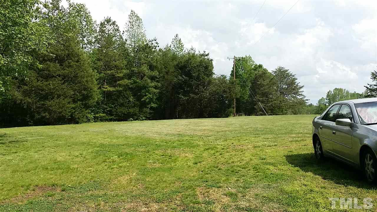2707 McDade Store Road Cedar Grove, NC 27231 - Photo 11 of 25 Another view of the large rear and side yards. Lots of space for activities