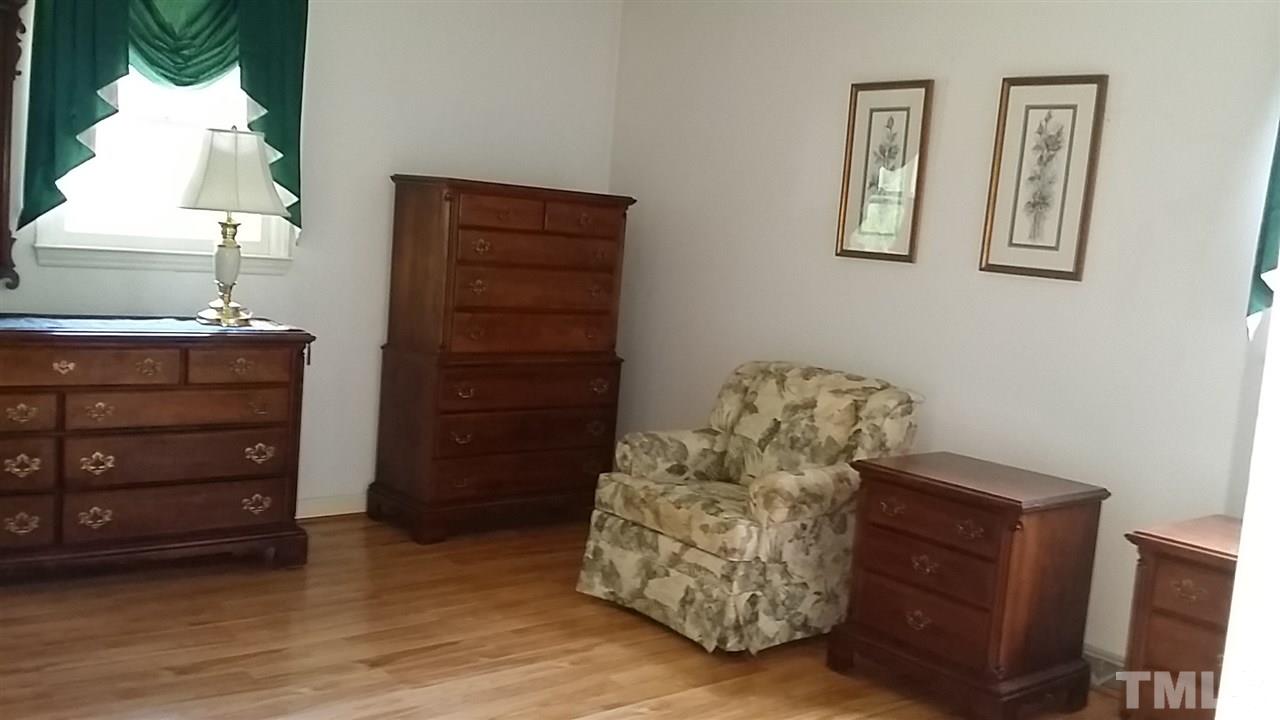 2707 McDade Store Road Cedar Grove, NC 27231 - Photo 21 of 25 Master bedroom has newer laminate flooring.