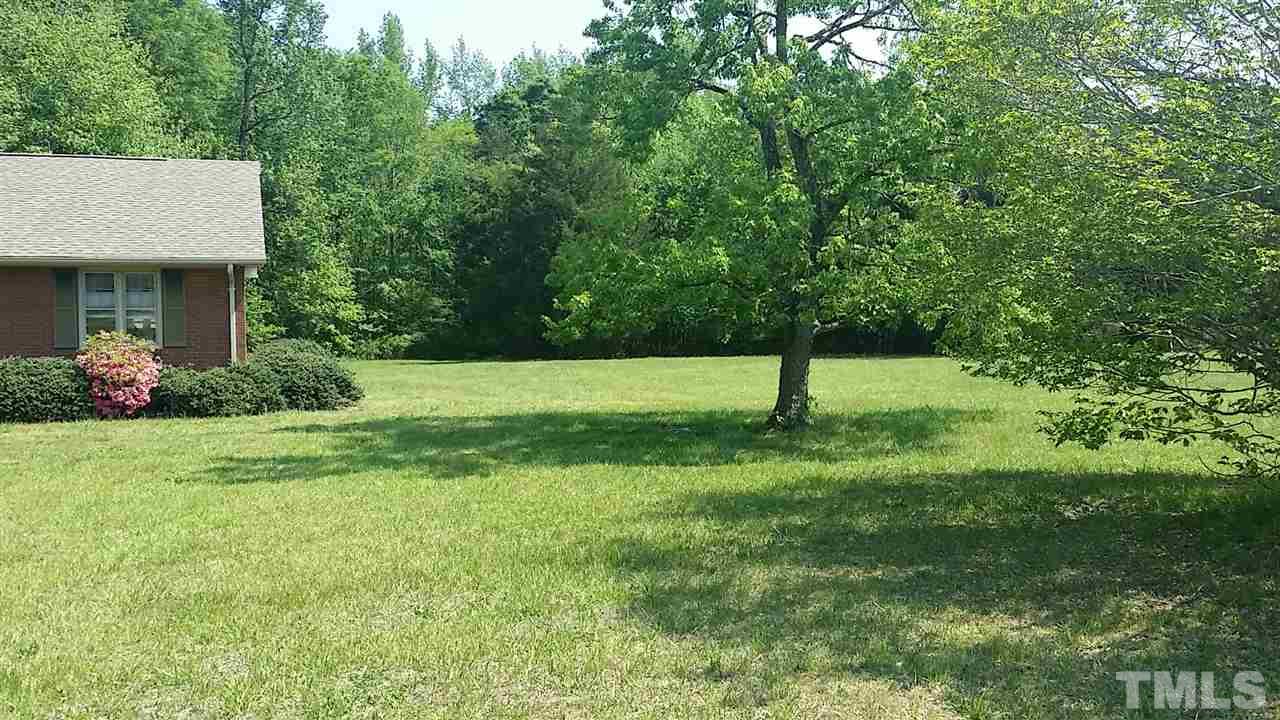 2707 McDade Store Road Cedar Grove, NC 27231 - Photo 5 of 25 Nice large side yard, ready for fencing or gardening or maybe a pool!