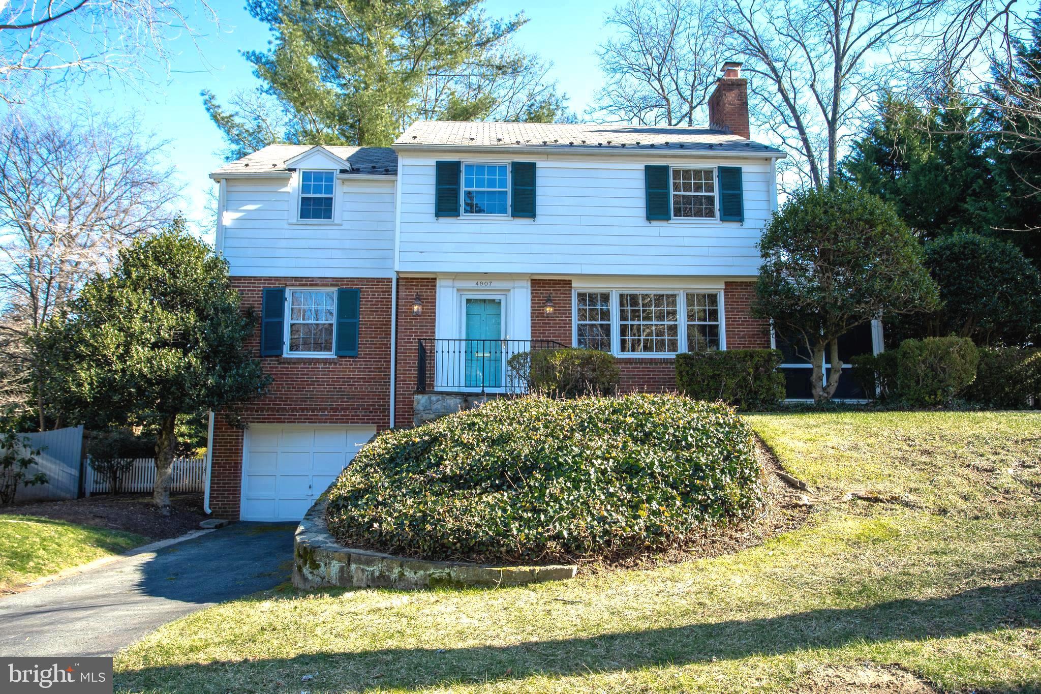4907 Scarsdale Road Bethesda, MD 20816 - Photo 1 of 1 a view of a house with a yard