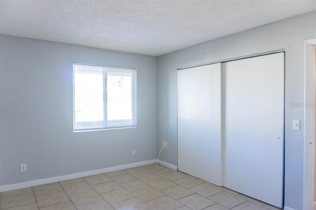 237 Thorntree Place, Unit 237 Brandon, FL 33510 - Photo 16 of 55 an empty room with windows