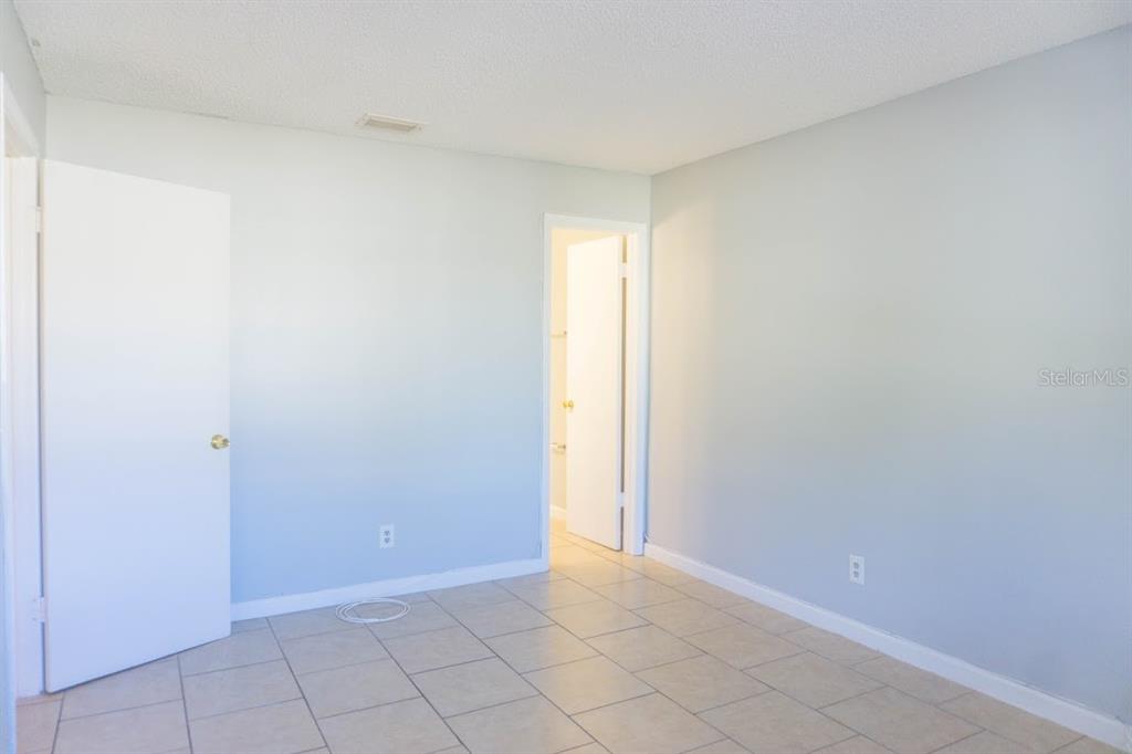 237 Thorntree Place, Unit 237 Brandon, FL 33510 - Photo 19 of 55 a view of an empty room and window