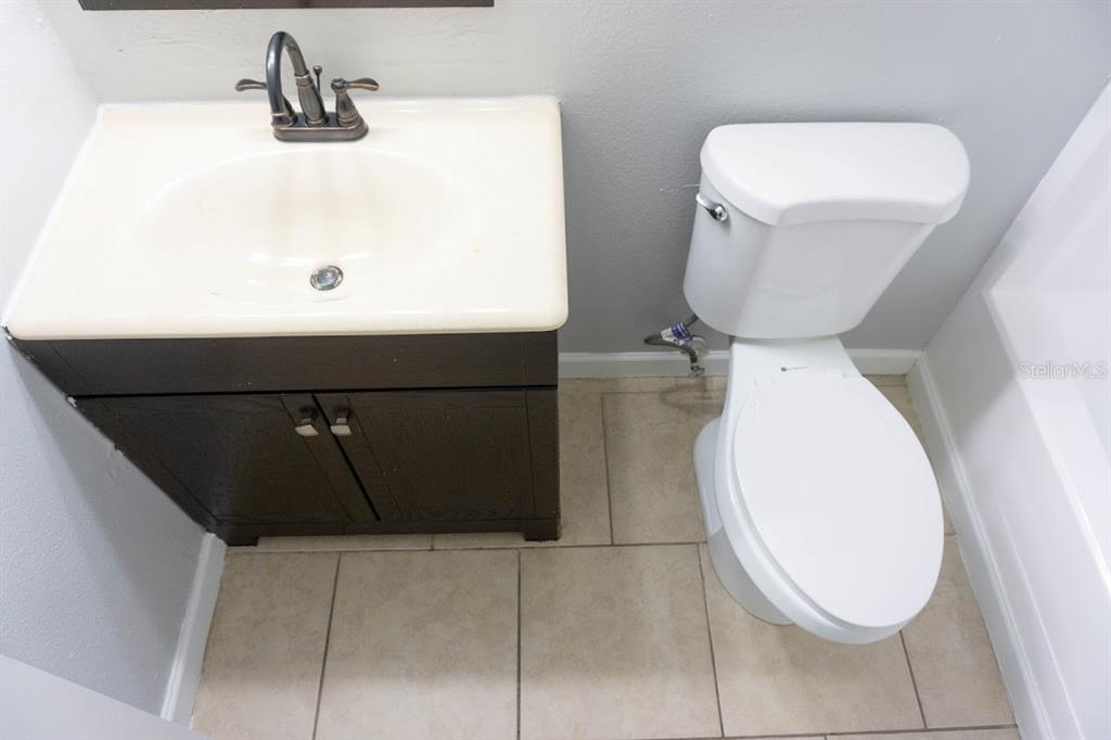 237 Thorntree Place, Unit 237 Brandon, FL 33510 - Photo 30 of 55 a bathroom with a toilet and a sink