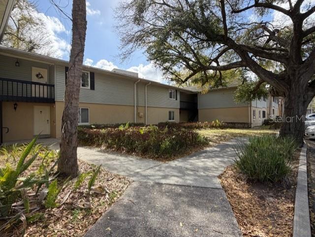 237 Thorntree Place, Unit 237 Brandon, FL 33510 - Photo 38 of 58 a front view of a house having yard