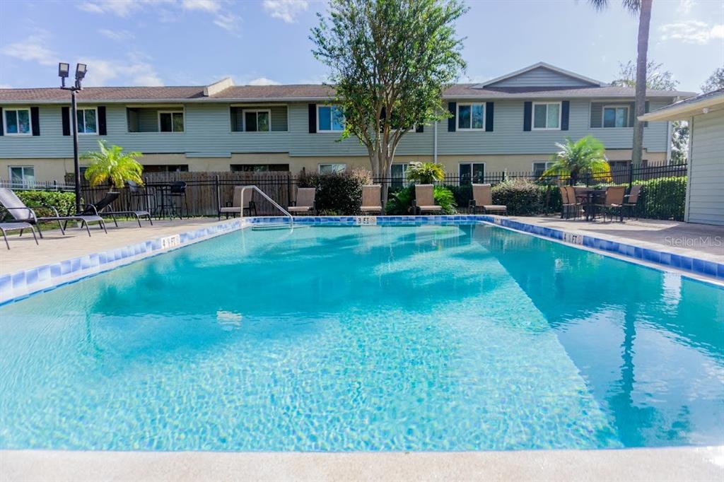 237 Thorntree Place, Unit 237 Brandon, FL 33510 - Photo 45 of 55 a front view of house with yard and outdoor seating
