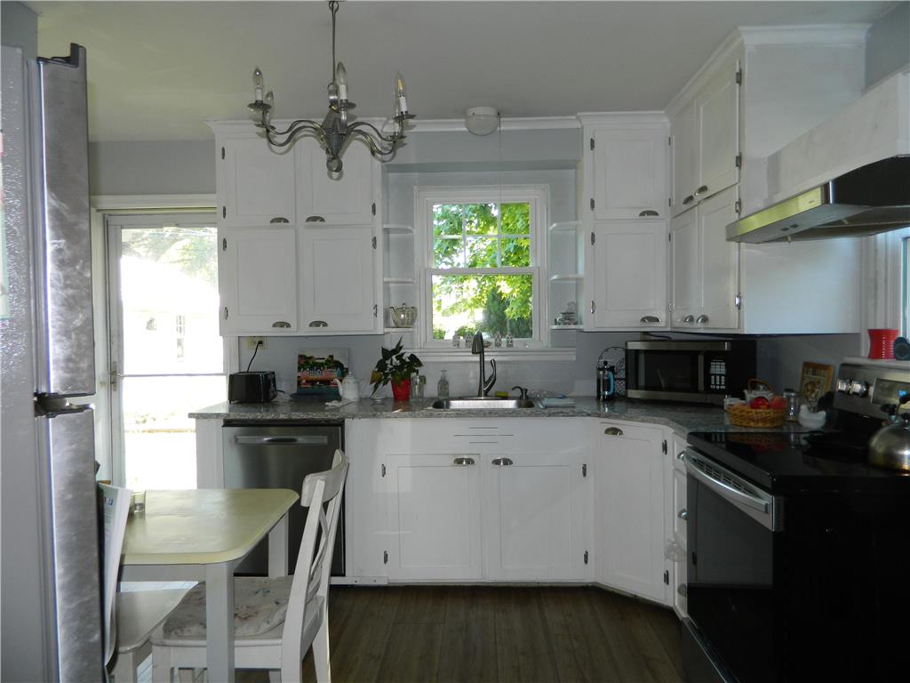 2130 Huntington Street Bethlehem, PA 18017 - Photo 12 of 23 A well-equipped kitchen features white cabinetry and light-colored countertops for everyday convenience.