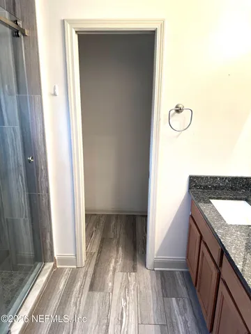 a view of a bathroom from a balcony