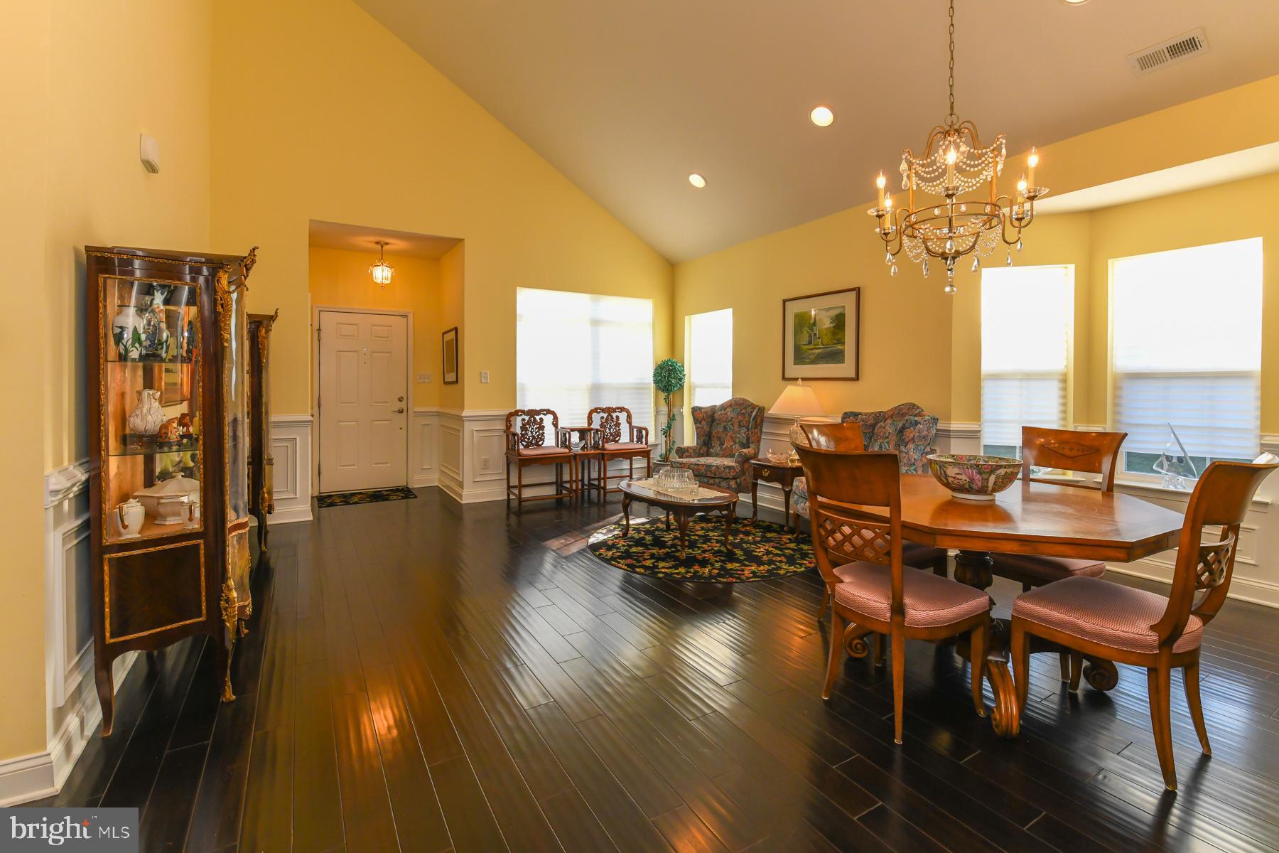 111 Weatherby Lane Glassboro, NJ 08028 - Photo 16 of 95 a view of a dining room with furniture window and wooden floor