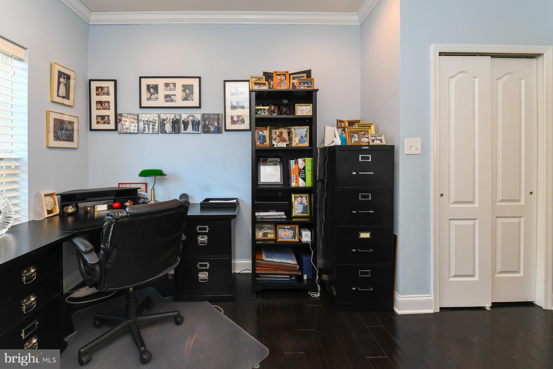 111 Weatherby Lane Glassboro, NJ 08028 - Photo 18 of 95 a view of a workspace with bookshelf and a window