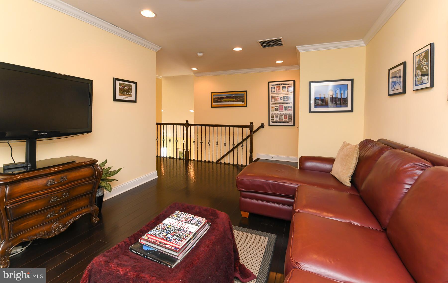 111 Weatherby Lane Glassboro, NJ 08028 - Photo 41 of 95 a living room with furniture and a flat screen tv