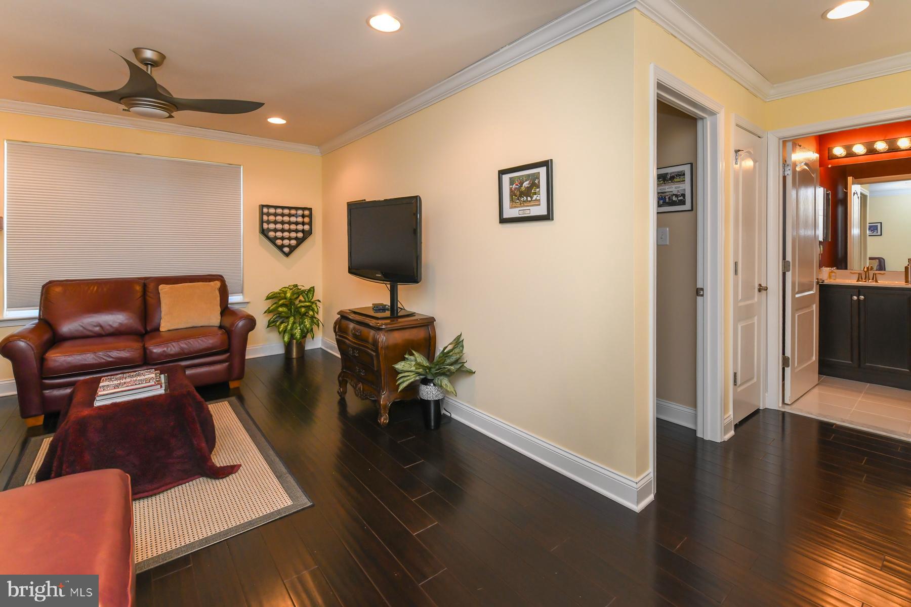 111 Weatherby Lane Glassboro, NJ 08028 - Photo 44 of 95 a living room with furniture and a wooden floor