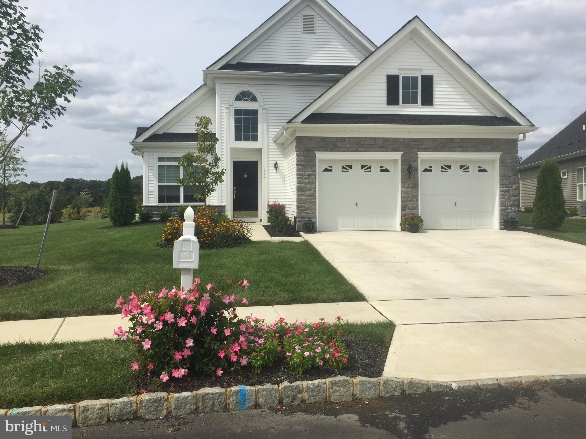 111 Weatherby Lane Glassboro, NJ 08028 - Photo 5 of 95 a front view of a house with a yard and garage