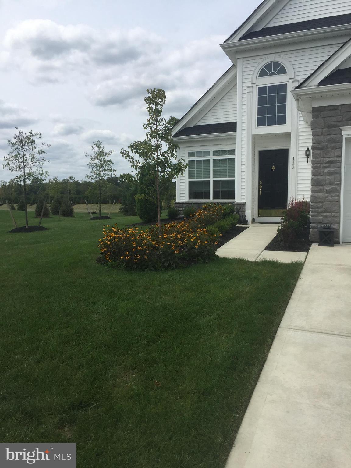 111 Weatherby Lane Glassboro, NJ 08028 - Photo 6 of 95 a front view of a house with garden