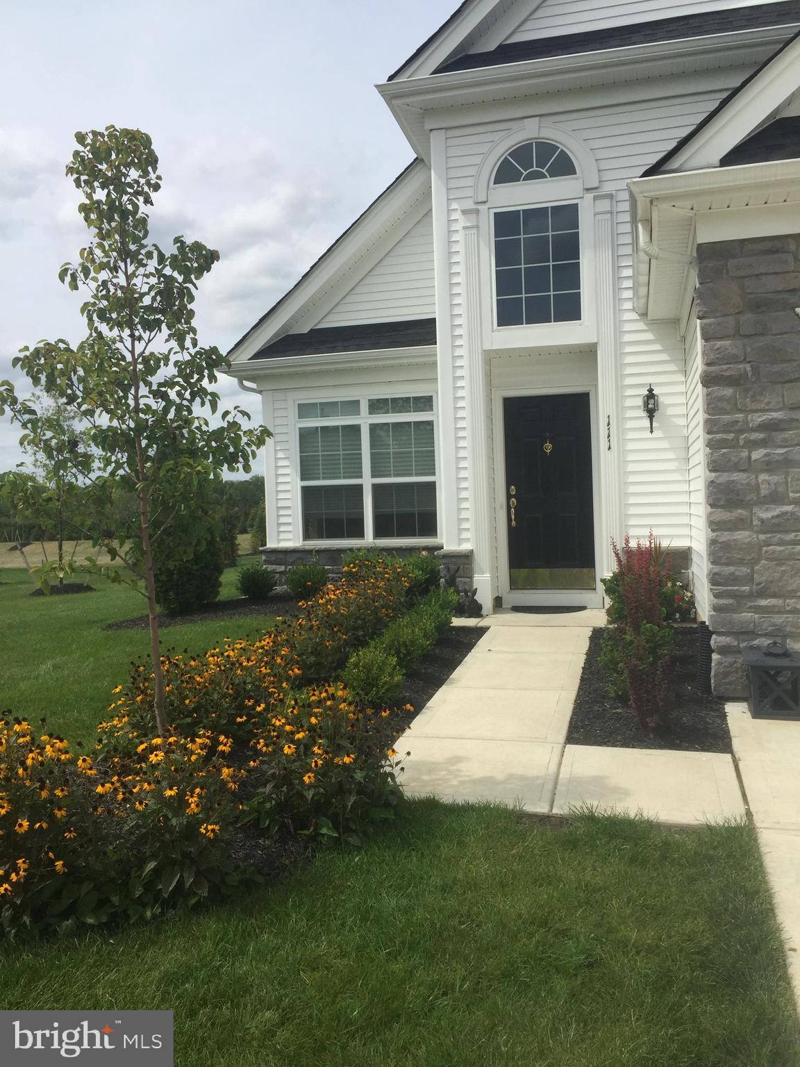 111 Weatherby Lane Glassboro, NJ 08028 - Photo 9 of 95 a front view of a house with garden