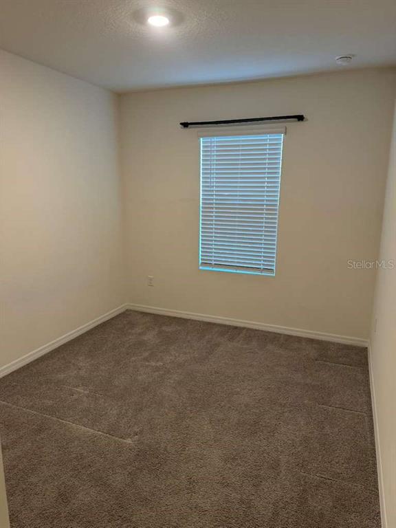 1773 Rock Elm Road Davenport, FL 33837 - Photo 14 of 23 an empty room with a window