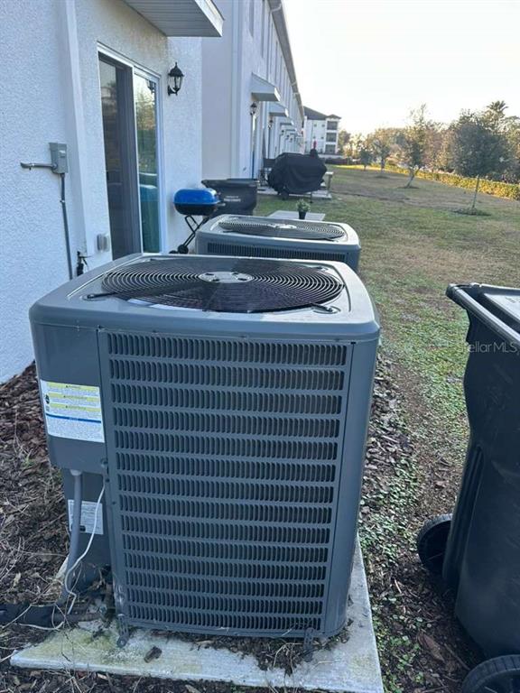 1773 Rock Elm Road Davenport, FL 33837 - Photo 7 of 23 a front view of a house with garden