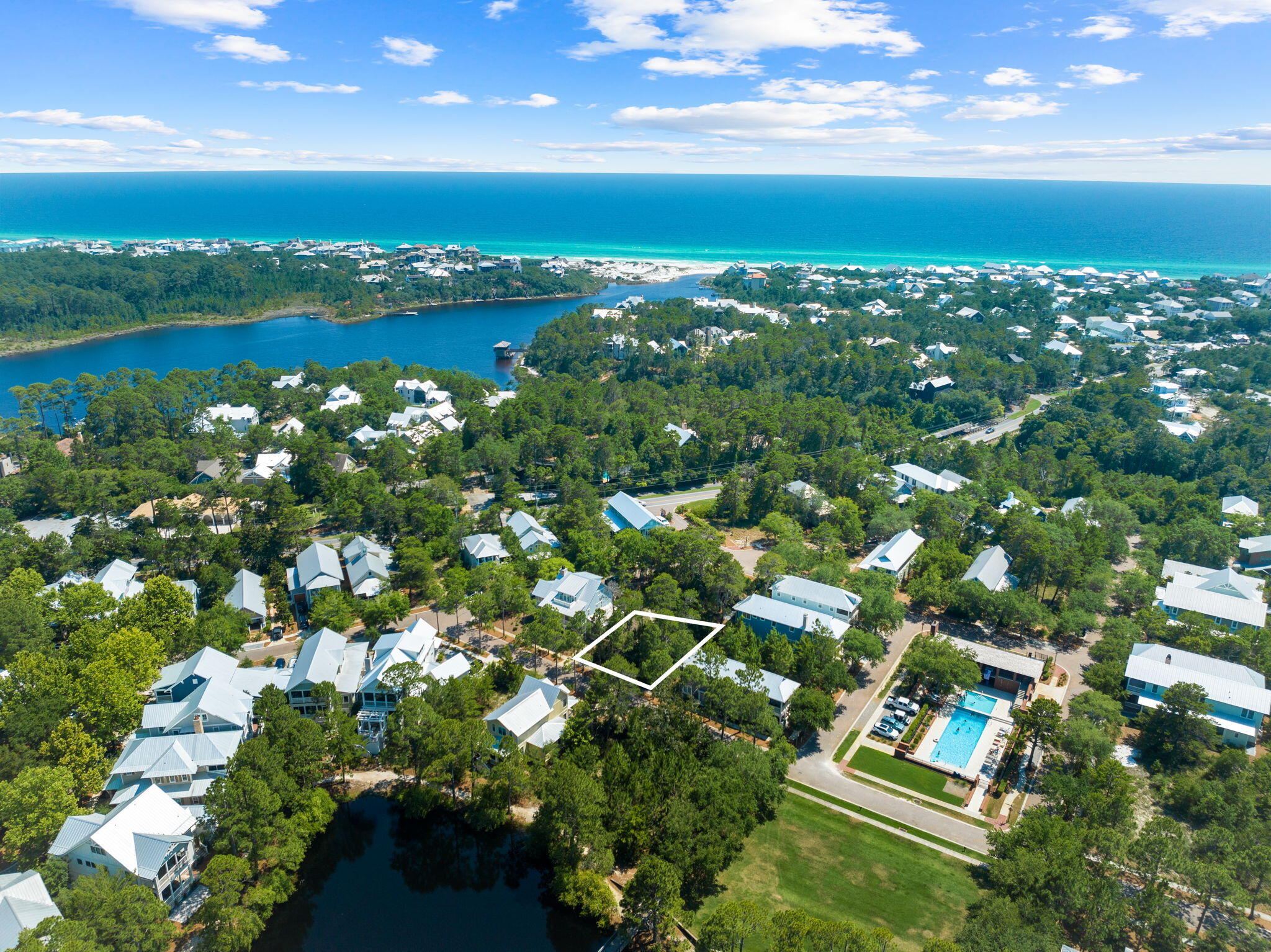 a view of lake with a city