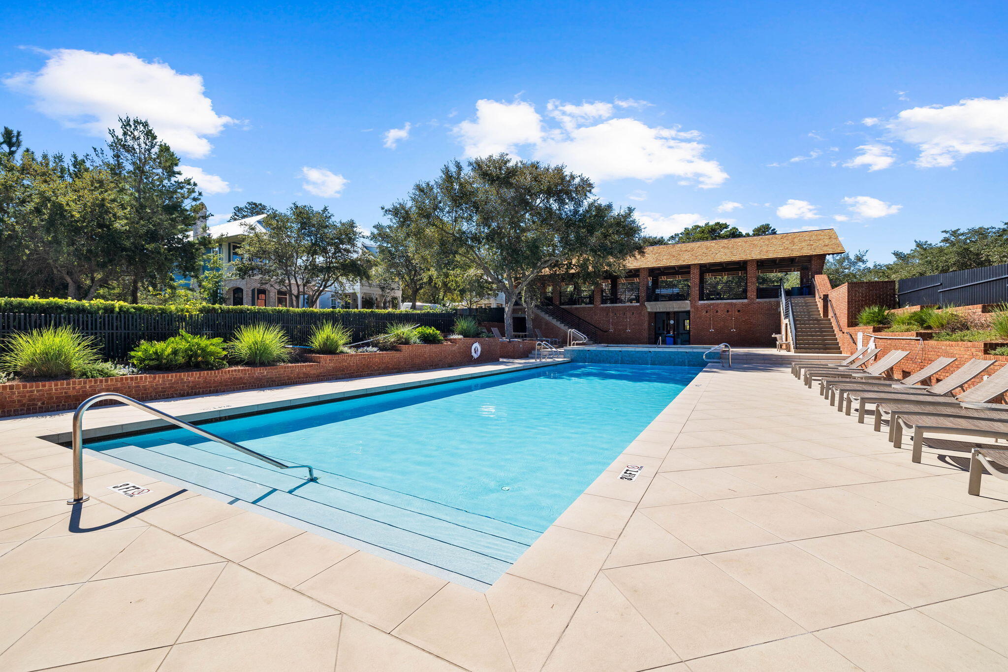 Lot 66 Lanier Lane Santa Rosa Beach, FL 32459 - Photo 13 of 18 a view of swimming pool with seating area and trees in the background