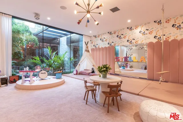 a view of a dining room with furniture window and outside view