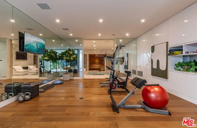 a view of a room with gym equipment