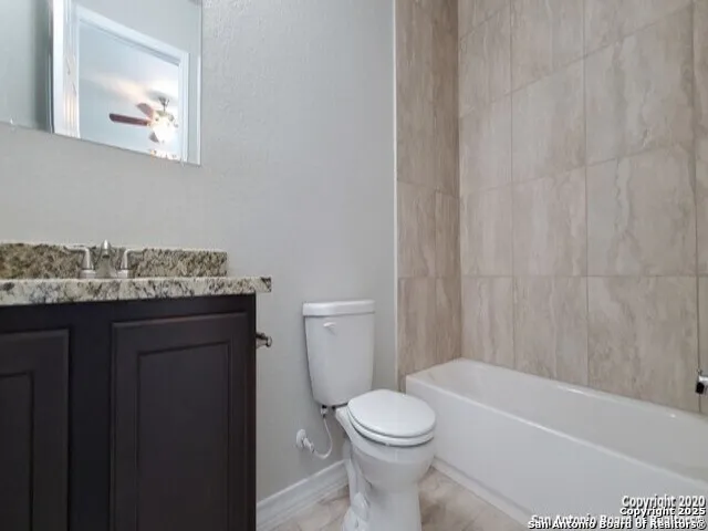 a bathroom with a shower curtain