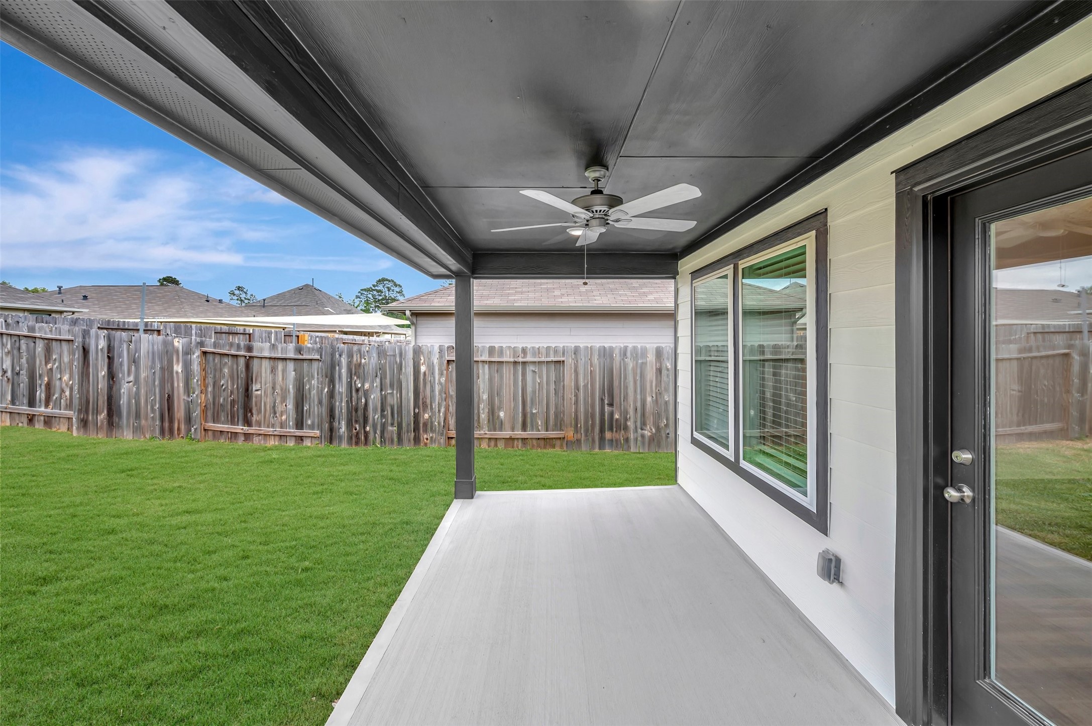543 Flower Reed Court Magnolia, TX 77354 - Photo 7 of 46 a view of a porch with a backyard