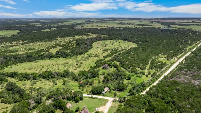 a view of a lake with a city